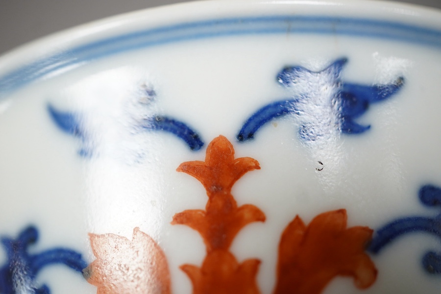 A Chinese underglaze blue and iron red bowl, Daoguang seal mark and possibly of the period